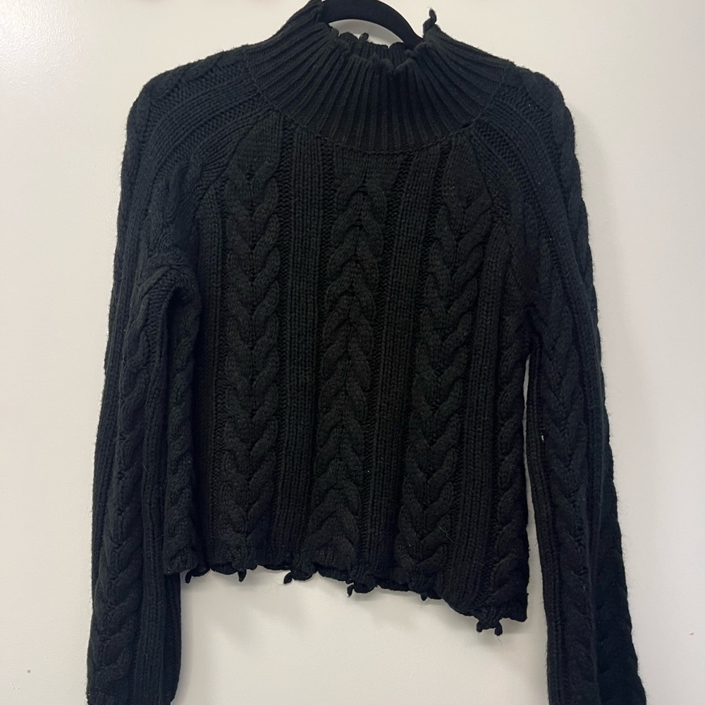 black cable knit sweater